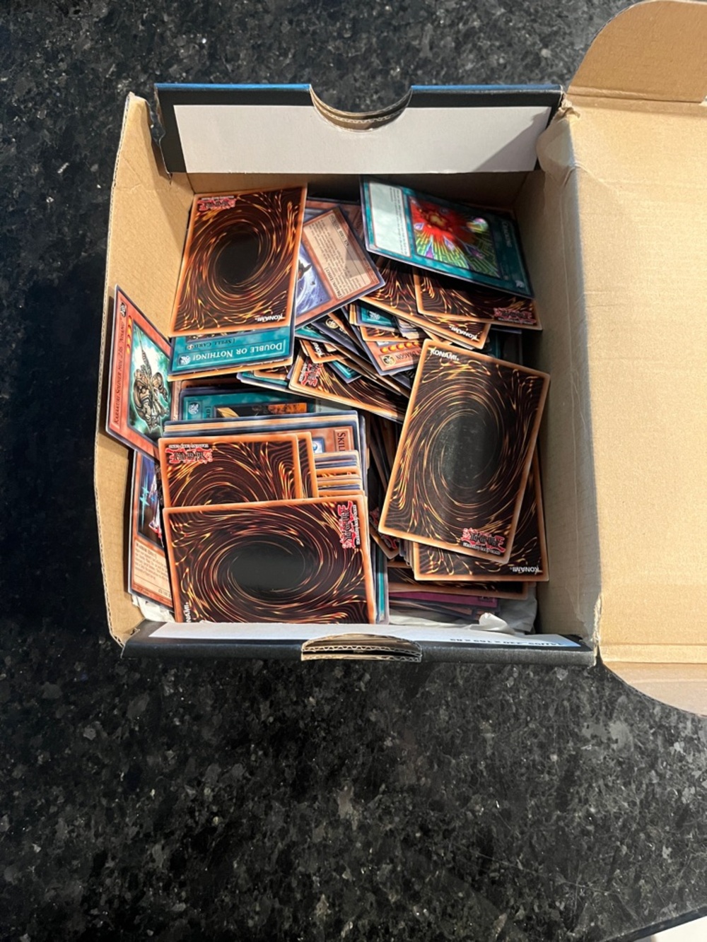 Yu-Gi-Oh! Trading Card Lot - Mixed Backs Visible (Black & Brown Swirl)